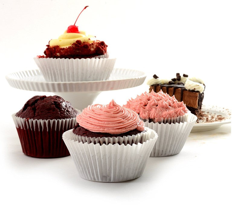 Assorted cupcakes on a white background