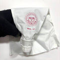 White piping bag with 'Noor Premium' branding on a white background
