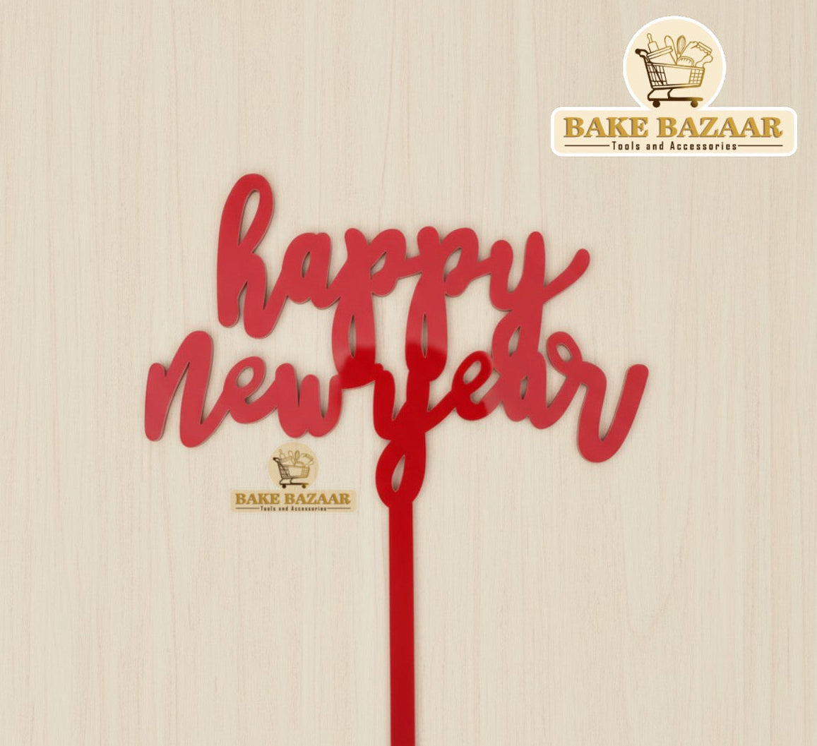 Red 'Happy New Year' cake topper with Bake Bazaar logo on a beige background