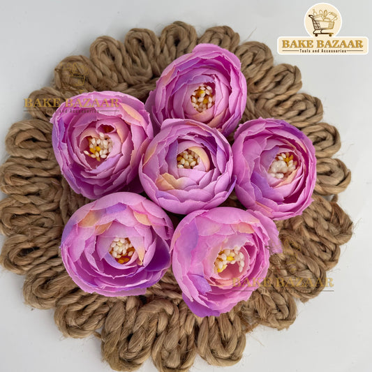 Decorative coaster with pink flowers on a jute mat, branded 'Bake Bazaar'.