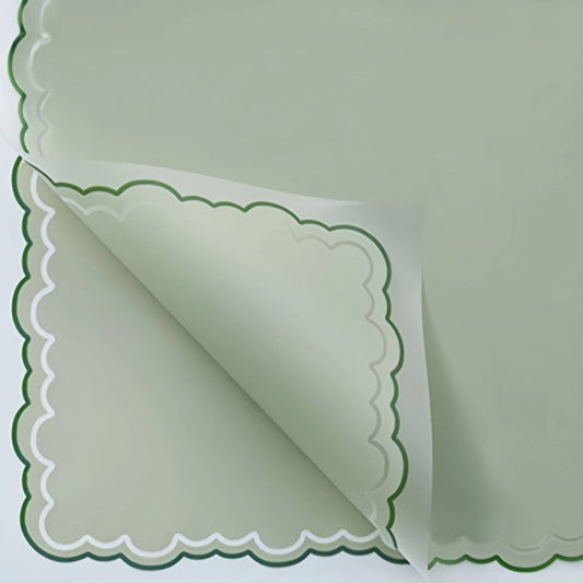White paper with green decorative edge on a white background, labeled 58CM x 58CM, 20 sheets per pack.